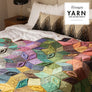 SCHEEPJES - Scrumptious colour pack - Imagen de una cama con una manta tejida con este hilo